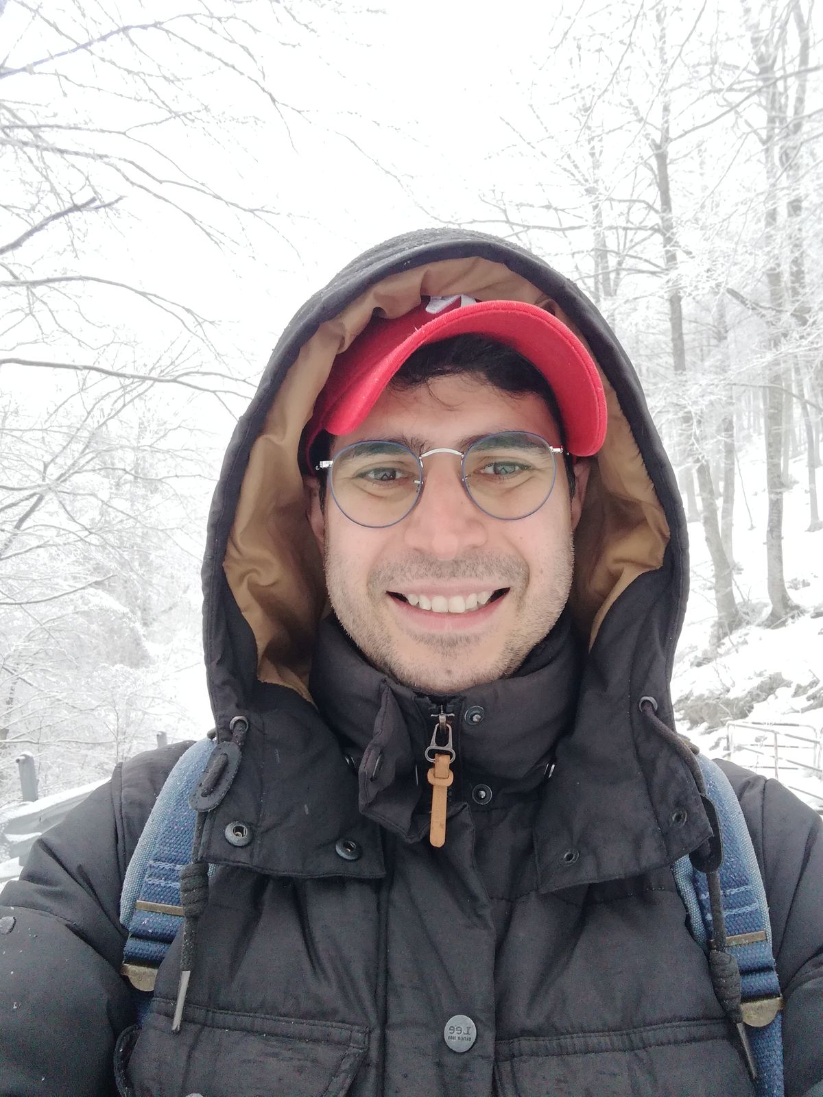 Elliott on a winter hike in snowy mountains above the house
